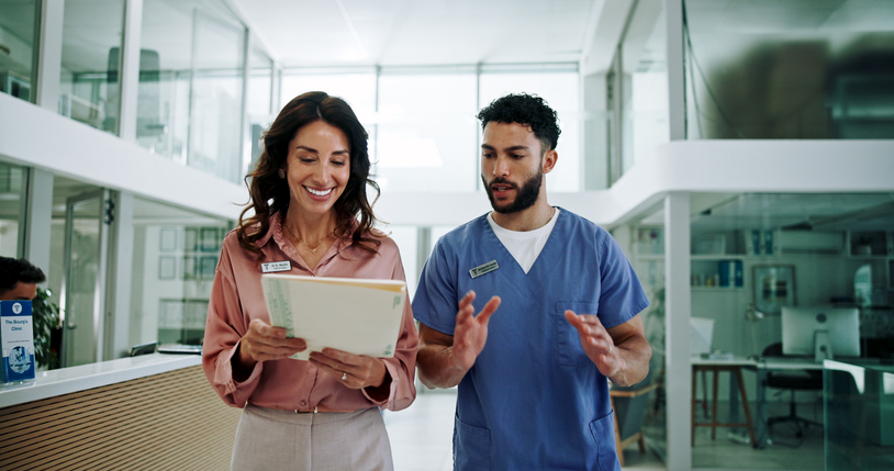 Hospital chief, teamwork and planning with doctor and woman for documents, schedule and feedback. Consultant, advice and medical with people in clinic for healthcare compliance, nurse and insurance Partnership Working That Actually Works: How We Collaborate With Clinical Teams